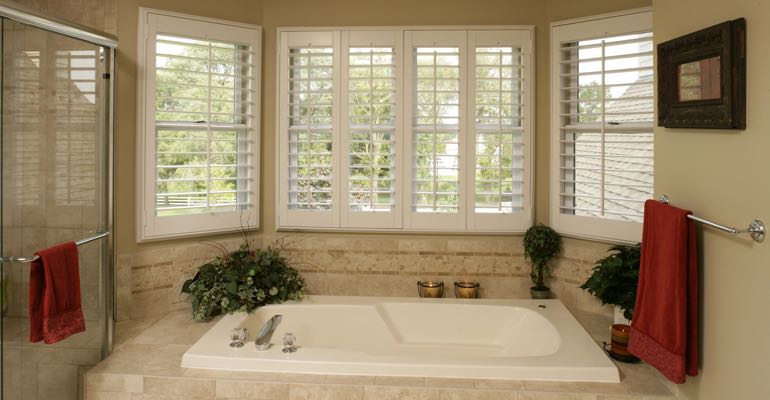 Plantation shutters in Honolulu bathroom.